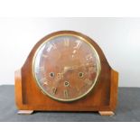 A Smiths mahogany mantle clock, with Roman Numeral dial.