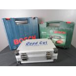 Bosch tools, both boxed and a boxed Quad Cut.