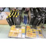 Nine Stanley plastic tool accessories boxes containing various accessories; screws, raw plugs,