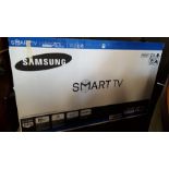 A Samsung 43inch Smart TV, boxed.