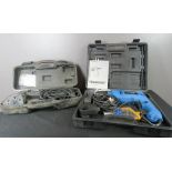A Powerbase Hammer Drill, boxed with instruction manual,[Unused] together with an electric sander.