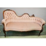 A Victorian chaise longue, with velour upholstered button back, and seat, carved decorative frame.