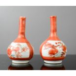 A pair of miniature Chinese red and white bottle vases, 9cm high.
