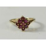 A 9ct gold ring, set with pink topaz in flowerhead form, size K, 2.4g.