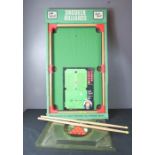 An original Steve Davis toy snooker table game.