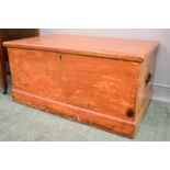An antique pine blanket chest.