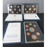 A group of Royal Mint proof sets: 93, 94, 85.