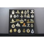 A quantity of military cap badges, British. (30)