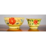 A 19th century Canary yellow bowl 15cm diameter, painted with red flowers, together with a Canary