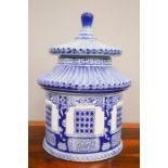 A 20th century blue and white Chinese pagoda form jar and cover, 32cm high.