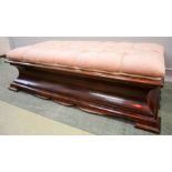 A Victorian rosewood ottoman / footstool with velvet upholstered button seat. 38cm high, 133cm wide,