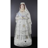 A 19th century Staffordshire flatback model of the Queen of England.
