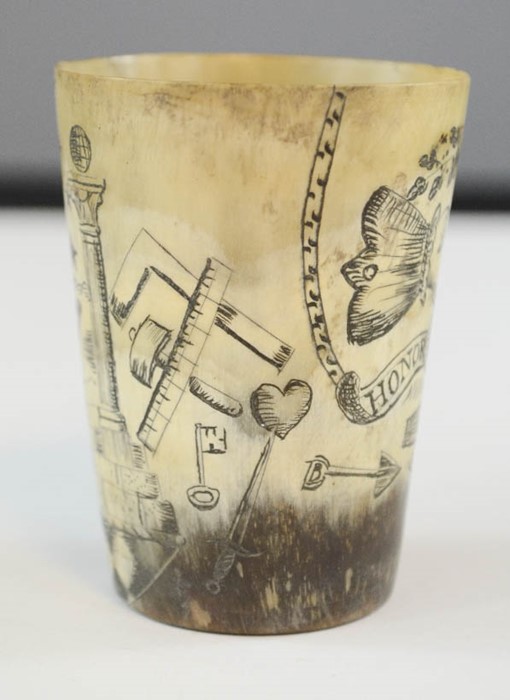 A carved horn beaker, engraved with prisoner of war style decoration,, 7cm high. - Image 2 of 4