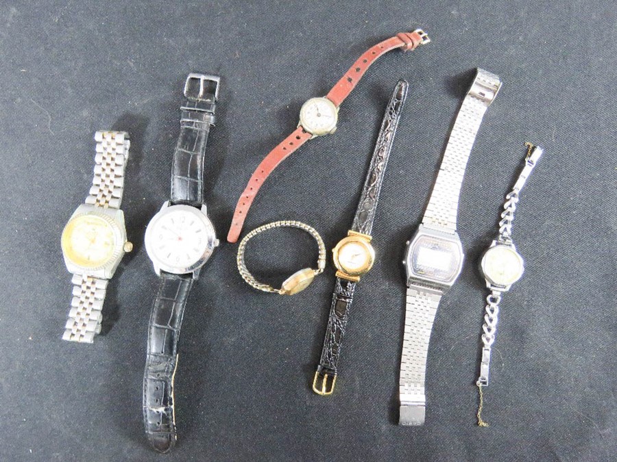 A group of watches, gentlemen and ladies examples, to include Casio, Rolex etc.