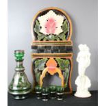 A Bohemian glass decanter set in green glass with lustre decoration, an Indian painted stand and a