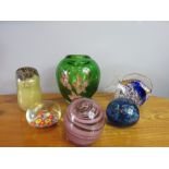 A group of paperweights; millefiori example, one in the form of an owl and a fish, together with a