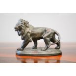 A small spelter lion, 9½cm high.