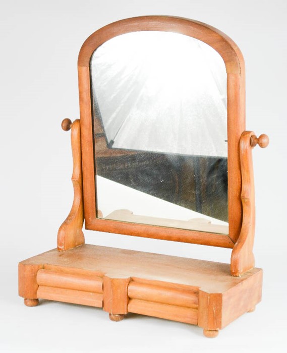 A mahogany Victorian toilet mirror.
