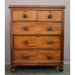 A Victorian mahogany chest of drawers, with two short and three long graduated drawers, raised on