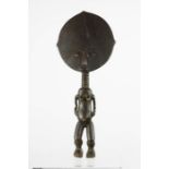 An African carved wooden fertility doll, 36cm high.