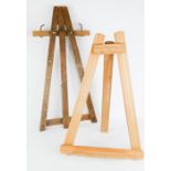 Two wooden table easels.