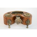 A late 18th/early 19th century inkwell, possibly French, raised on gilt metal feet, 9cm high.