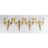 A set of four 19th century French ormolu, gilt bronze wall lights, 38cm high.