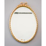 A giltwood wall mirror, with bow form top, 71 by 49cm.