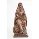 A late 17th/early 18th century carving of Saint Jerome, 58cm high.