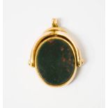 A gold plated and agate fob, 3½cm high.