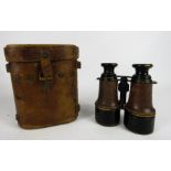 A WWI pair of binoculars with original leather case.