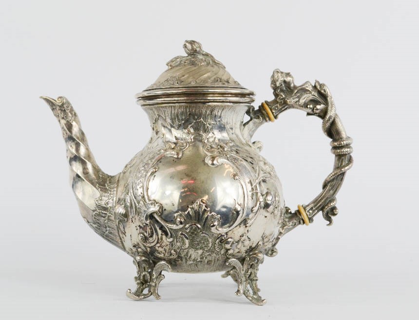 A silver tea pot, bearing German National Mark, 800 grade, Schauffer Dresden Mark, 18.98 toz.