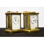 Two antique brass carriage clocks, with keys.