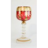 A tall glass goblet, with cranberry glass bowl and gilt decoration, 32cm high.