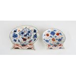 Two Chinese 18th century shell form dishes, in red white and blue, with gilded highlights, the