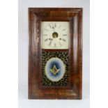 A 19th century mahogany wall clock, with a glass panel front, painted with a compass.