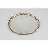 A Dresden silver salver, Mohl, 800 grade, with shaped border, 32cm wide.