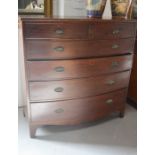 A Victorian mahogany chest of drawers, with two short above three long drawers, bow front.