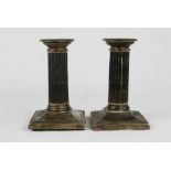 A pair of silver candlesticks, corinthian columns, London, 12cm high.