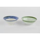 Two Japanese celadon glazed tea bowls.