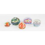 Five glass paperweights, of various style and form.