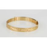 A 9ct gold babys bangle.