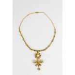 A yellow gold, diamond and pearl necklace, with a yellow gold cross style drop, set with seventy