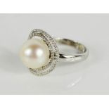 An 18ct white gold, diamond and South Sea pearl ring; 1.53ct, size S, original box and bag from