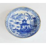 A 19th century Chinese blue and white dish, with gilded rim, 13cm diameter.