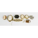 A group of jewellery to include four cameo brooches.