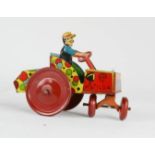 A tin plate wind up Matilda tractor.