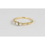 An 18ct gold, diamond and seed pearl set ring, size M, 1.8g.