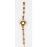 A 9ct gold ladies half hunter wristwatch, with Roman numeral dial, 28.1g.