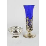 A silver rose vase with blue liner, engraved and pierced with decoration, together with a silver